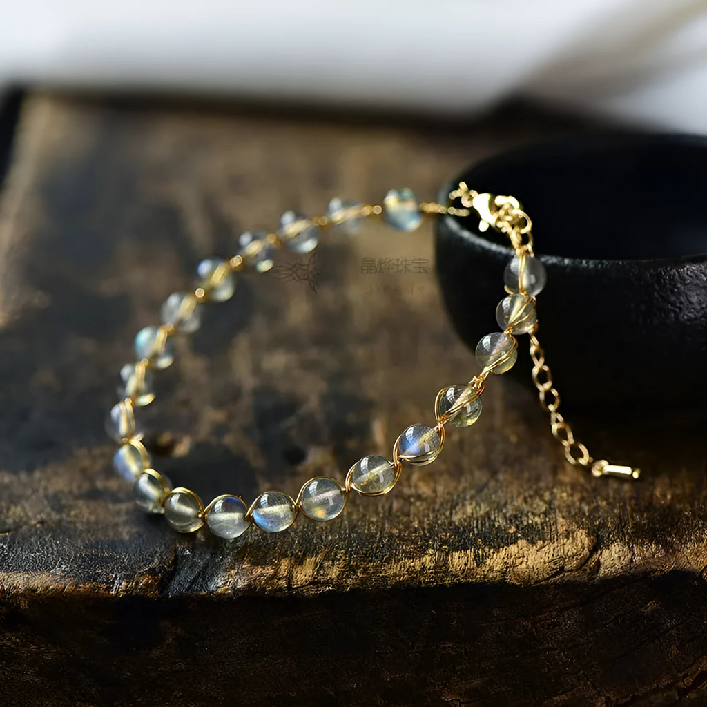 Women's moonstone crystal bracelet with 14K gold gilded metal and starry sky colour design