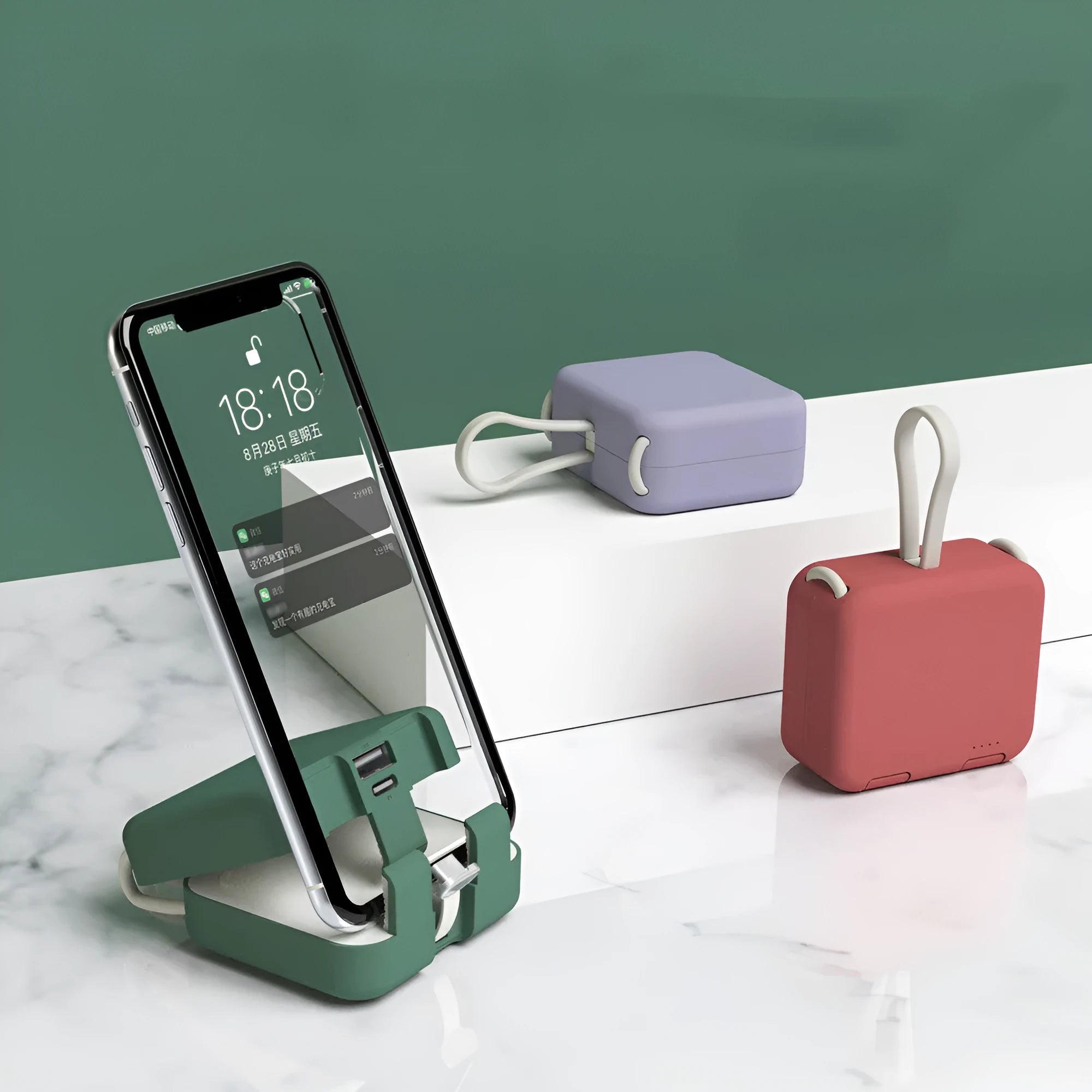 Handbag clip-on power bank in blue showing USB-A and Type-C ports, with phone propped in its integrated stand.