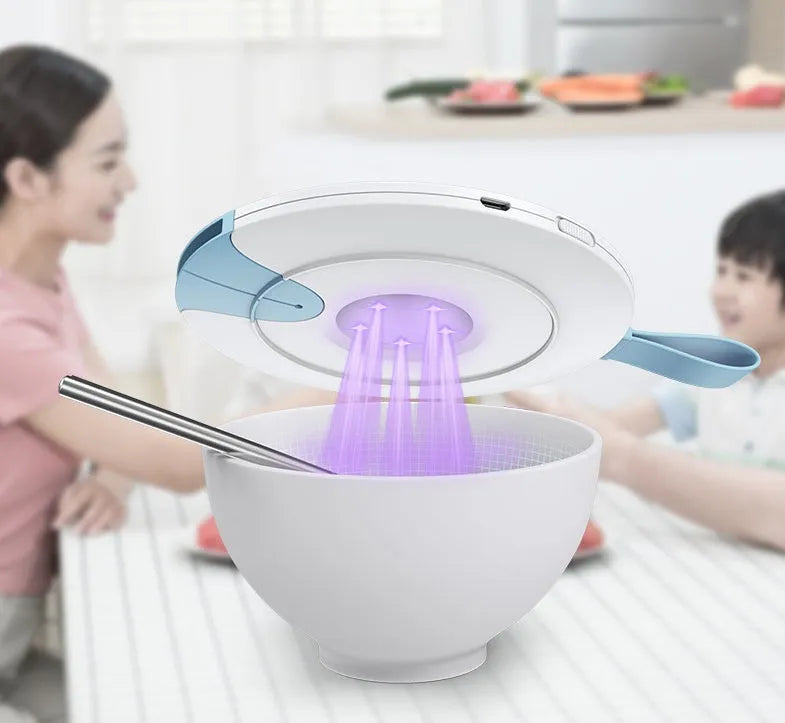 Slim blue portable UV-C baby bottle steriliser showing USB port and dimensions