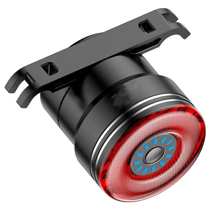 Black aluminium alloy smart brake sensing USB charging bicycle taillight showing dimensions