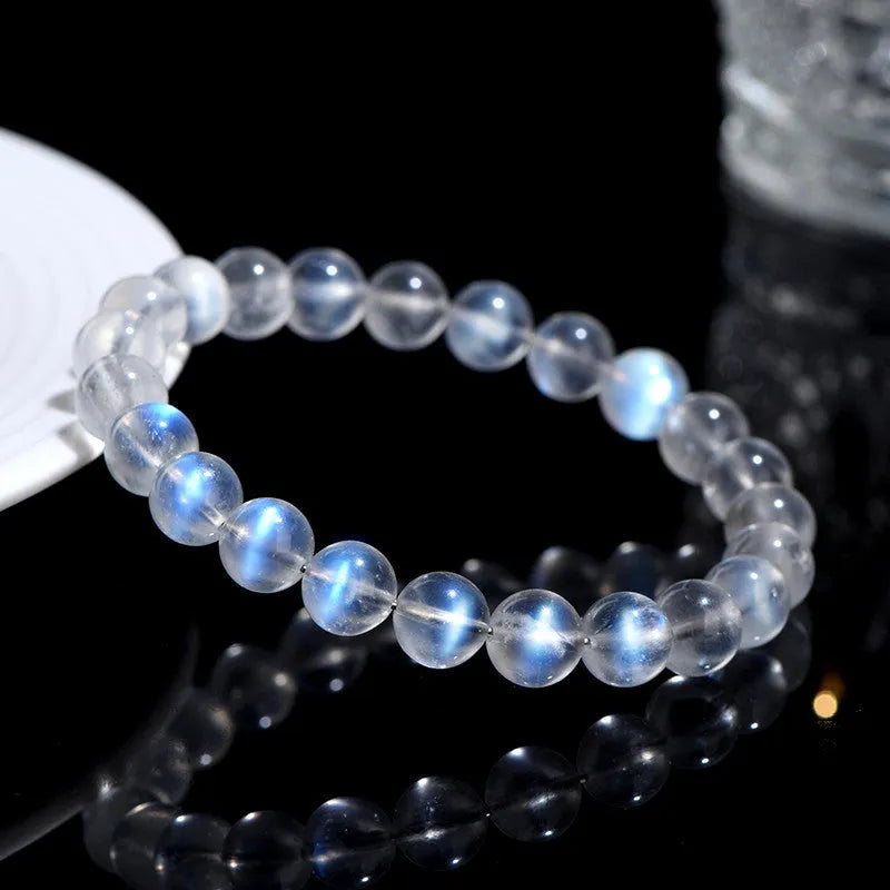 Natural Cream Body Blue Moonlight crystal bracelet with smooth ground beads.