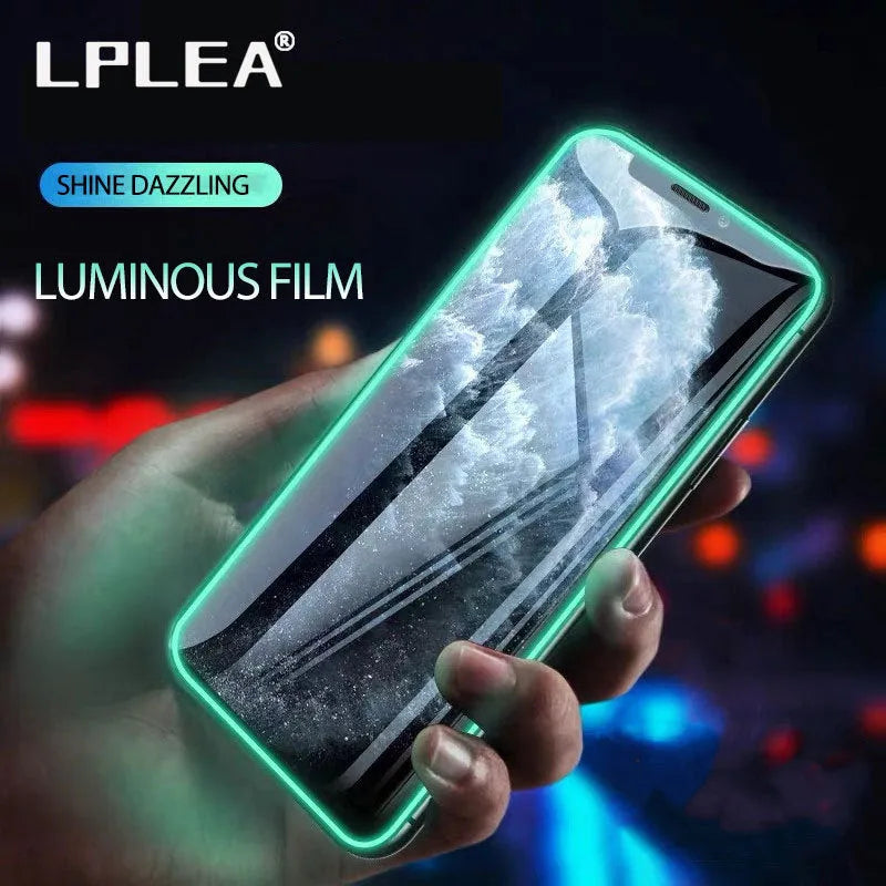 Luminous tempered glass screen protector glowing in the dark next to an iPhone.