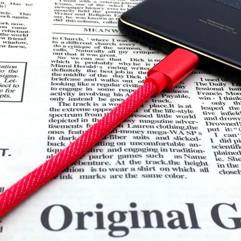Cowboy-style denim braided USB-C charging cable in black with aluminium connectors.