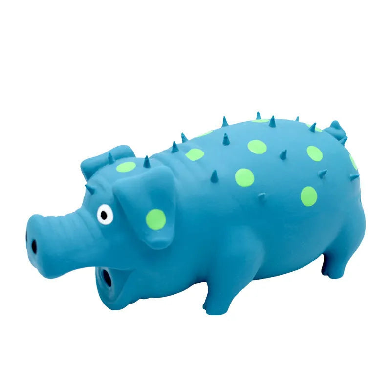 Blue latex pig-shaped dog chew toy with textured surface and squeaker for aggressive chewers