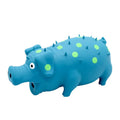 Blue latex pig-shaped dog chew toy with textured surface and squeaker for aggressive chewers