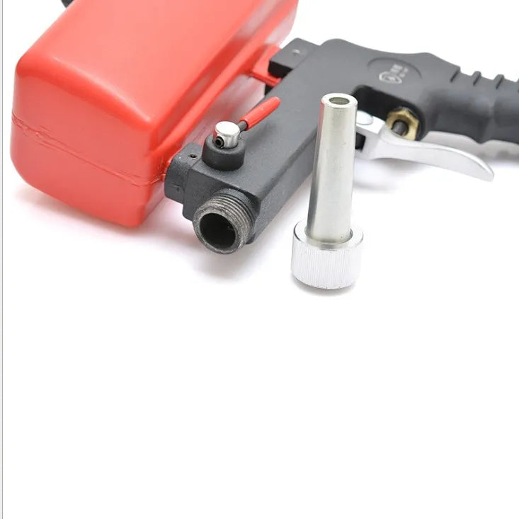 Portable pneumatic sandblasting gun with 21 litre tank for industrial surface preparation work