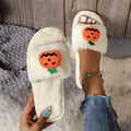 Pumpkin design plush slippers with synthetic fur upper and anti-slip soles in white or yellow