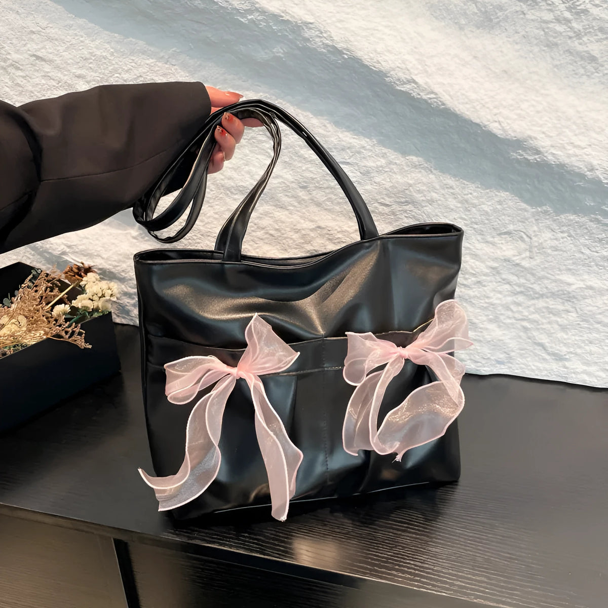 College style bow tote bag in black and pink with large capacity and internal zip compartment