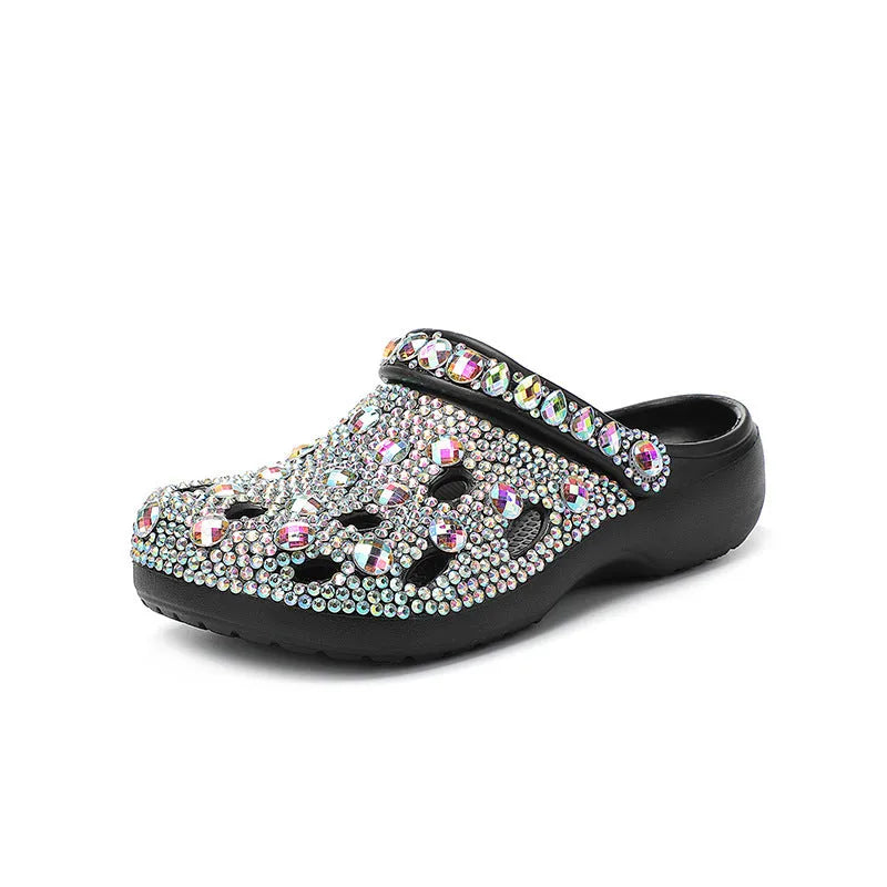 Black women's platform sandals with rhinestone detail on EVA upper.