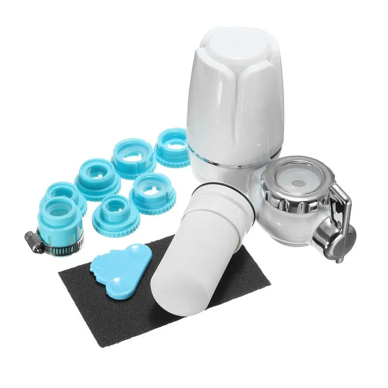 White faucet-mounted water purifier with ceramic filter and adapter kit for kitchen tap installation.