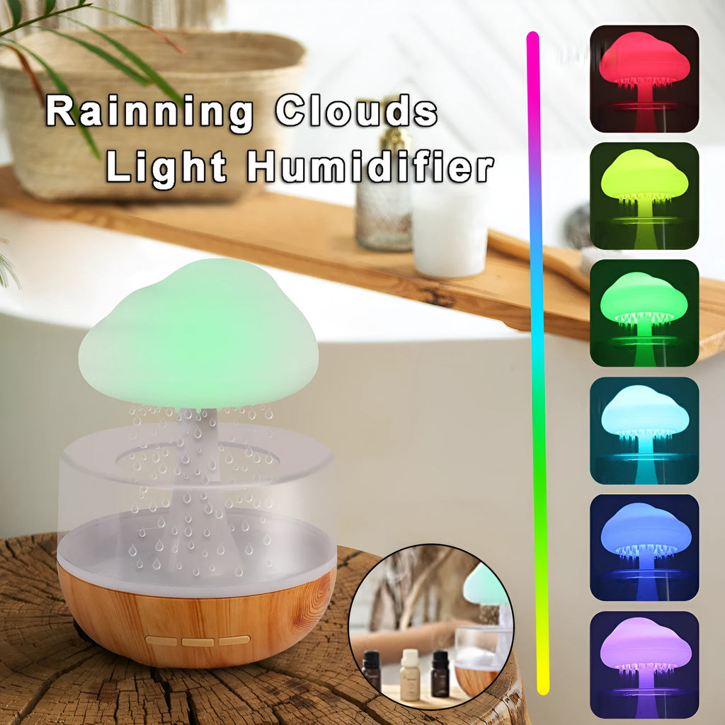 White raining cloud-shaped humidifier with night light and water drop essential oil diffuser.