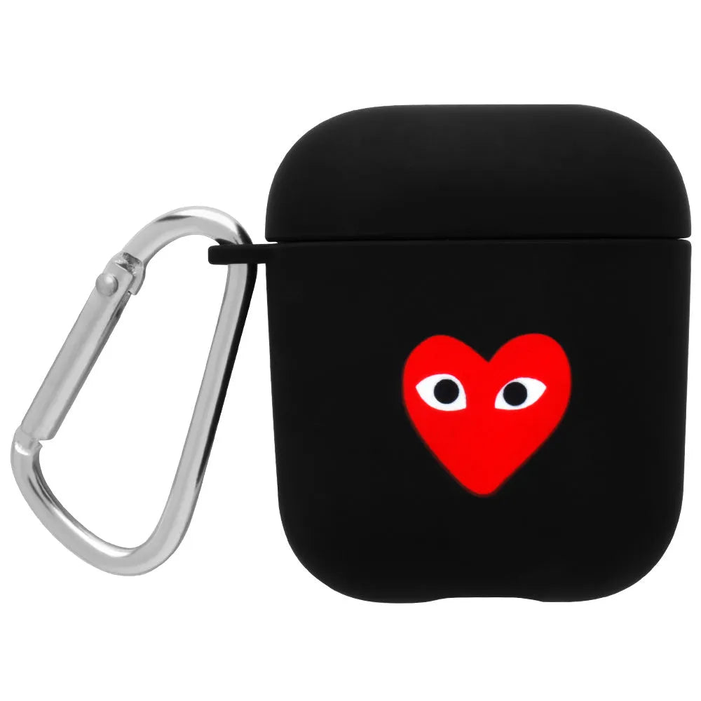 Black and pink AirPods earphone covers with decorative flower and smiley face back designs.