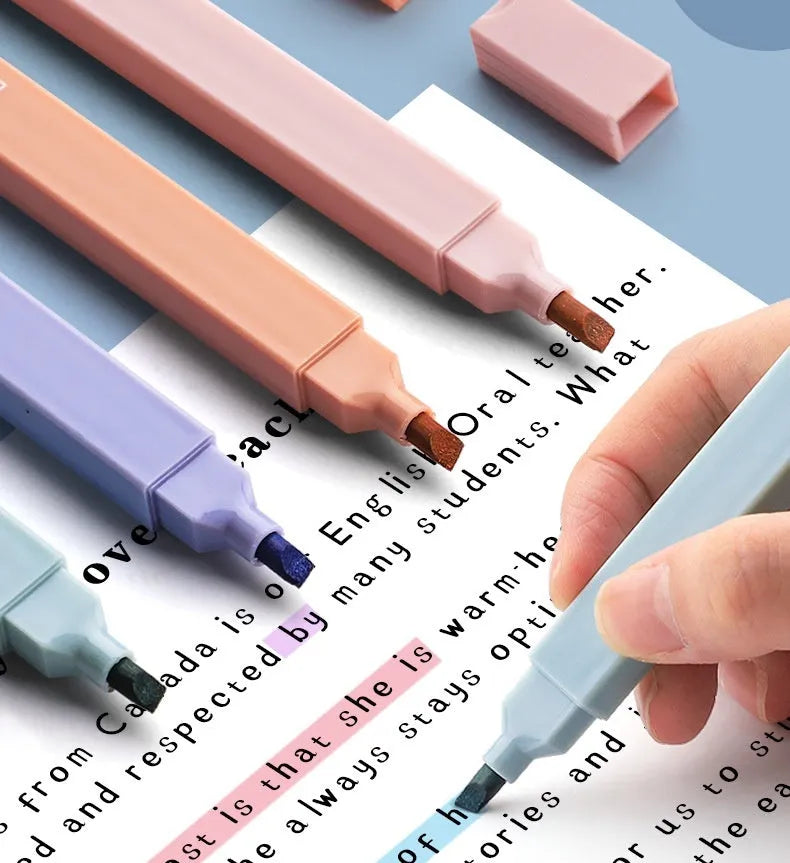 Double-headed fluorescent marker pens showing chisel and bullet tips in mixed colours