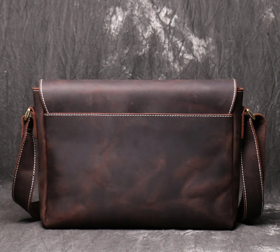 Men's vintage brown leather messenger bag with flap cover and adjustable shoulder strap