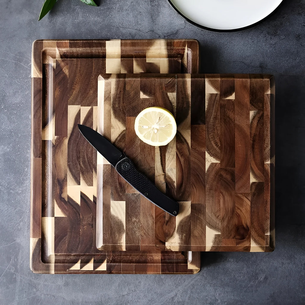 Brown solid acacia wood cutting board with 3cm thickness on a kitchen counter.