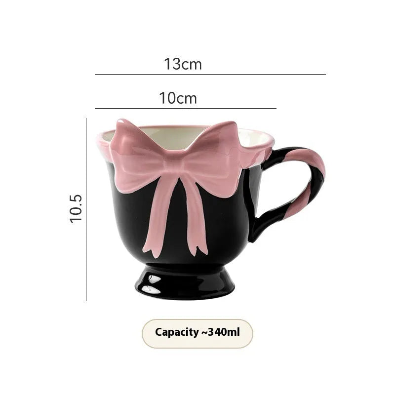 Ceramic mug with heart bow design in black pink or white powder, 301-400ml capacity