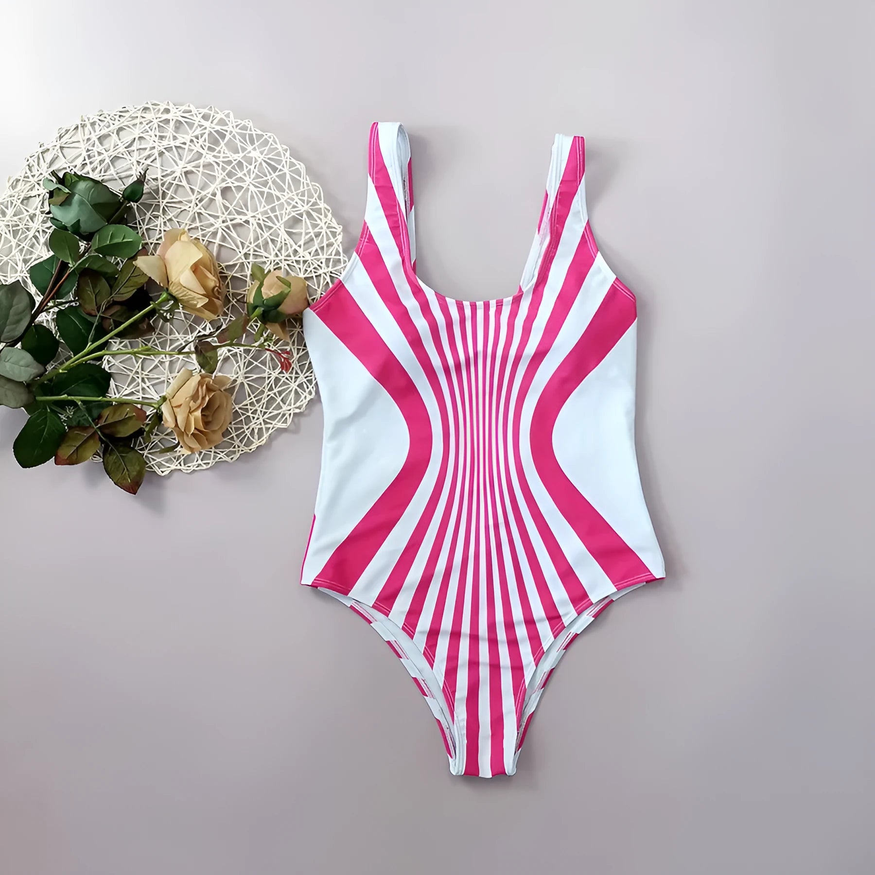 Pink striped women's one-piece swimsuit with digital printing on front and back.