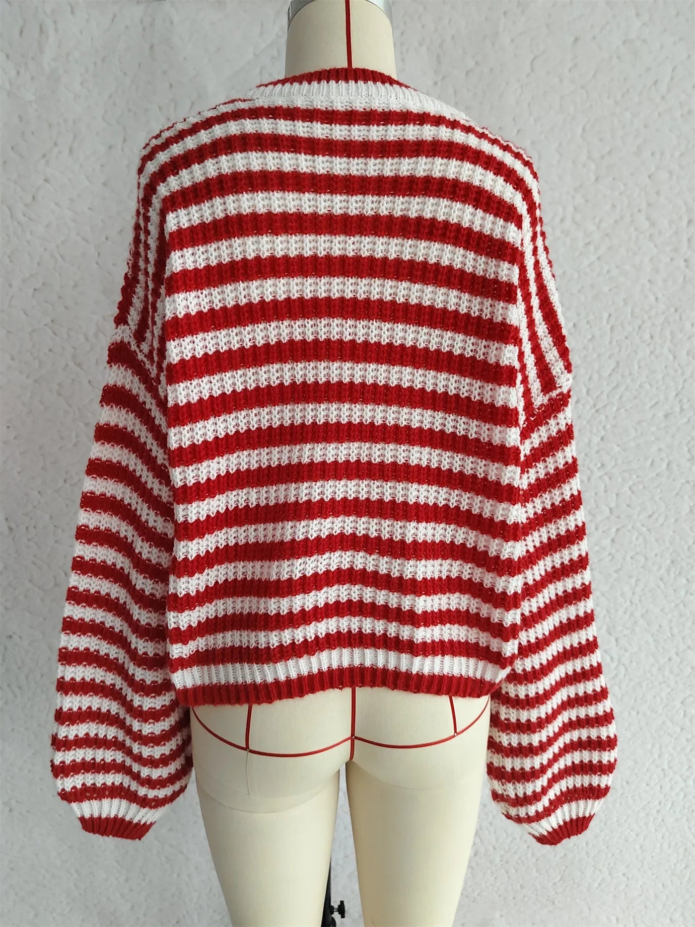 Women's vintage stripe knitted pullover sweater with round neck and long loose sleeves in polyester fabric