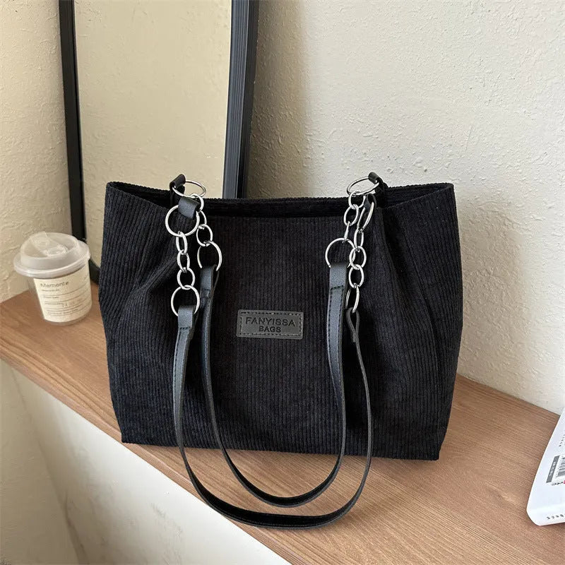 Corduroy one-shoulder tote handbag in street trend style with three-dimensional pocket