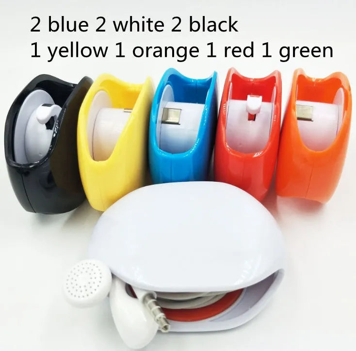 Automatic earphone cable winder retractor in assorted colours on a white background.