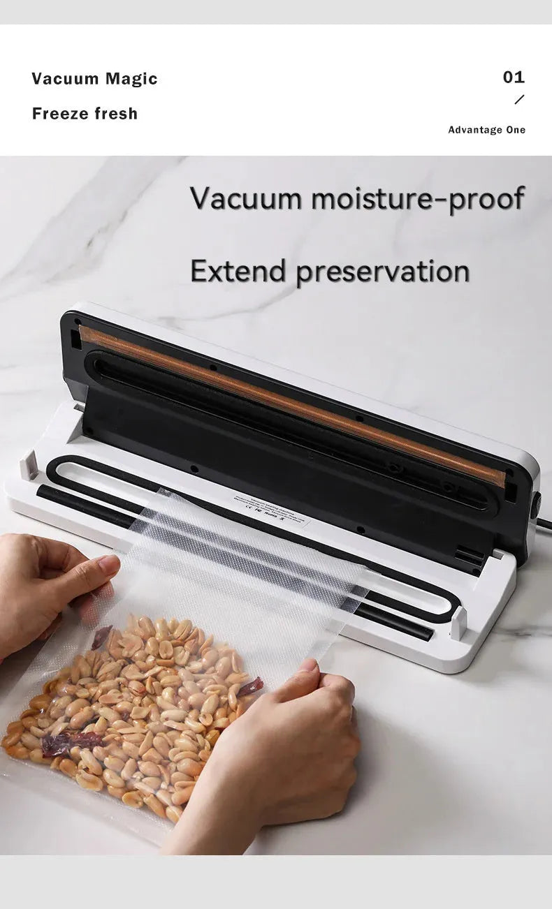 White automatic vacuum sealer machine on a kitchen countertop.
