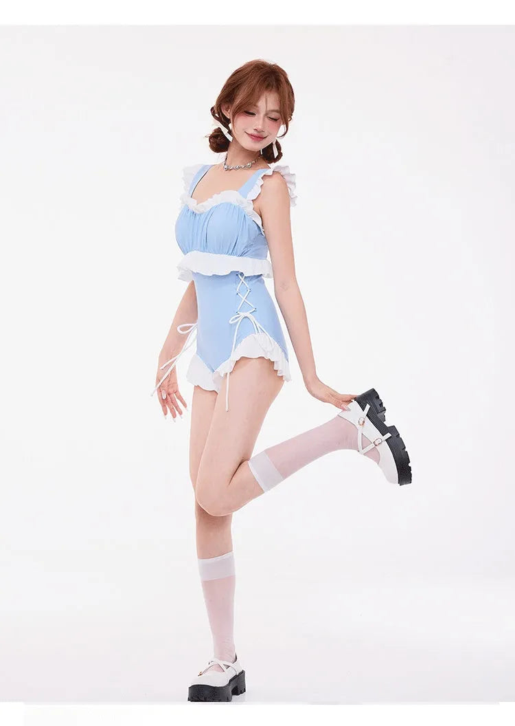 Light blue women's high-waist one-piece swimsuit with lace chest detail and backless design.