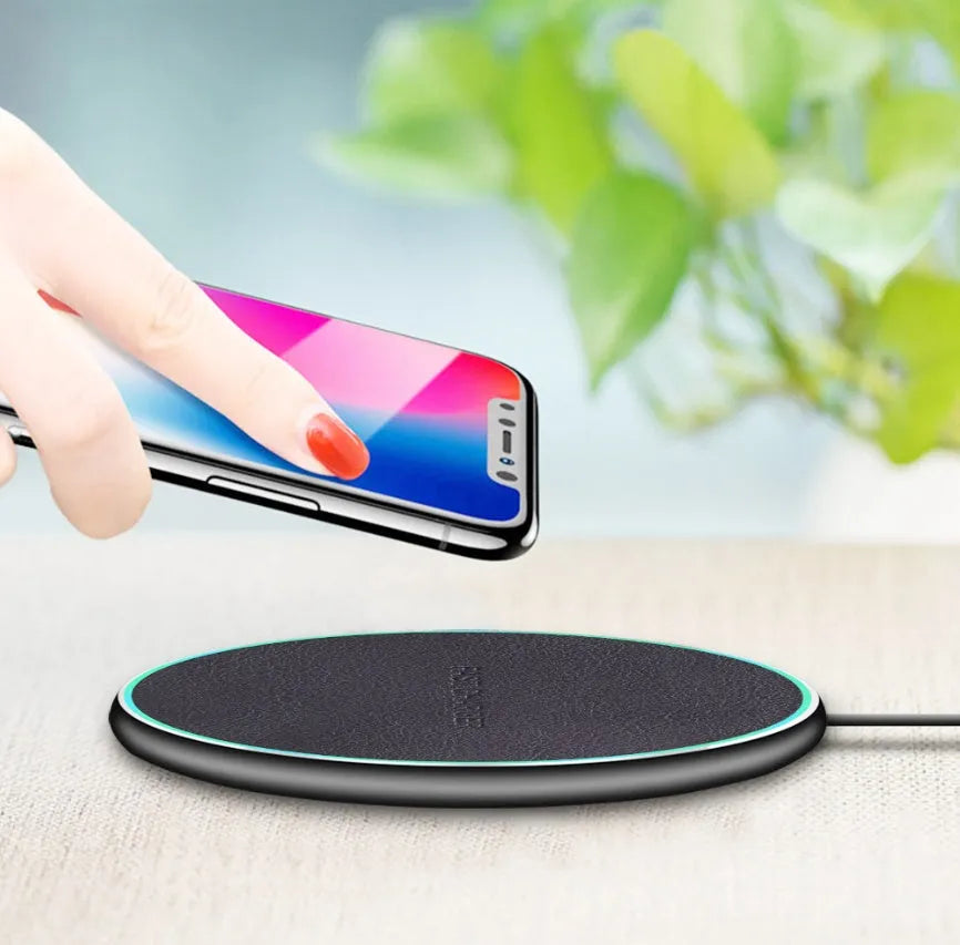 Black Qi wireless charger for iPhone 11 with 10W fast charging capability