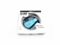 Blue external USB SIM card reader for backing up mobile phone contacts and messages.