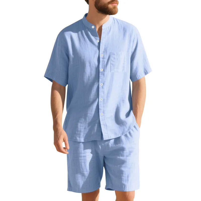 Men's linen two-piece summer suit with Henry collar jacket and matching shorts in light blue colour