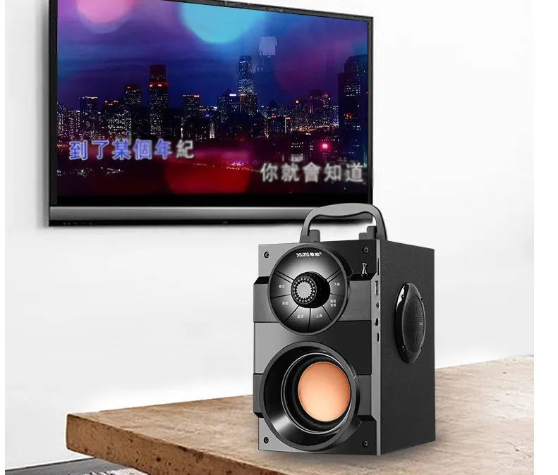 Black portable mini audio system with subwoofer, main box, satellite box, and 1.2 metre connection cable.