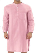 Man wearing a dark blue cotton shirt robe with button front and chest pockets.