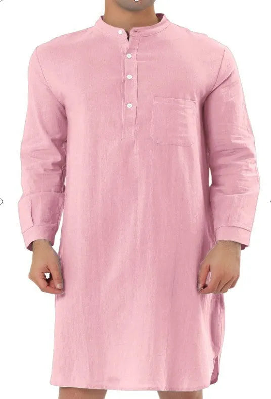Man wearing a dark blue cotton shirt robe with button front and chest pockets.
