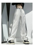 Women's ribbon contrast loose straight trousers in navy blue with low-waist fit and thin fabric