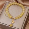 Citrine stone bracelet with Chinese character tassel in mixed materials