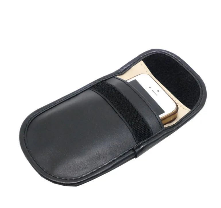 Black microfiber Faraday cage bag for blocking key fob and card signals, shown with dimensions 13.5cm by 9.5cm.