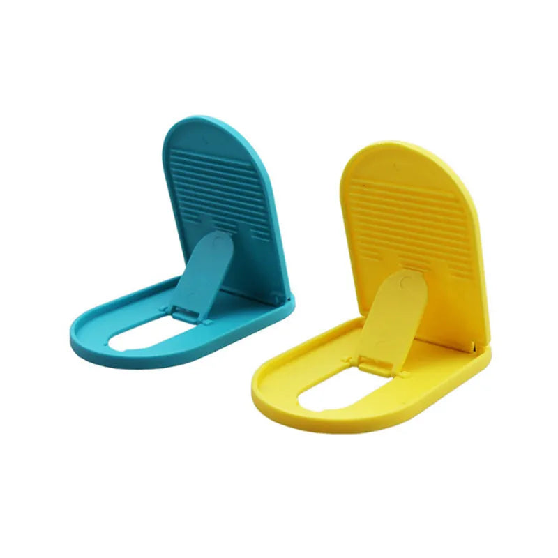 Plastic mobile phone stand with lazy bracket, holding a smartphone, shown in multiple colour options.
