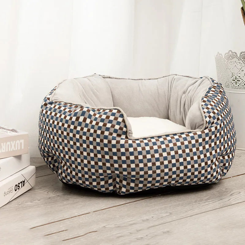 Blue octagonal pet bed with soft wool point design and removable mat for a small dog.