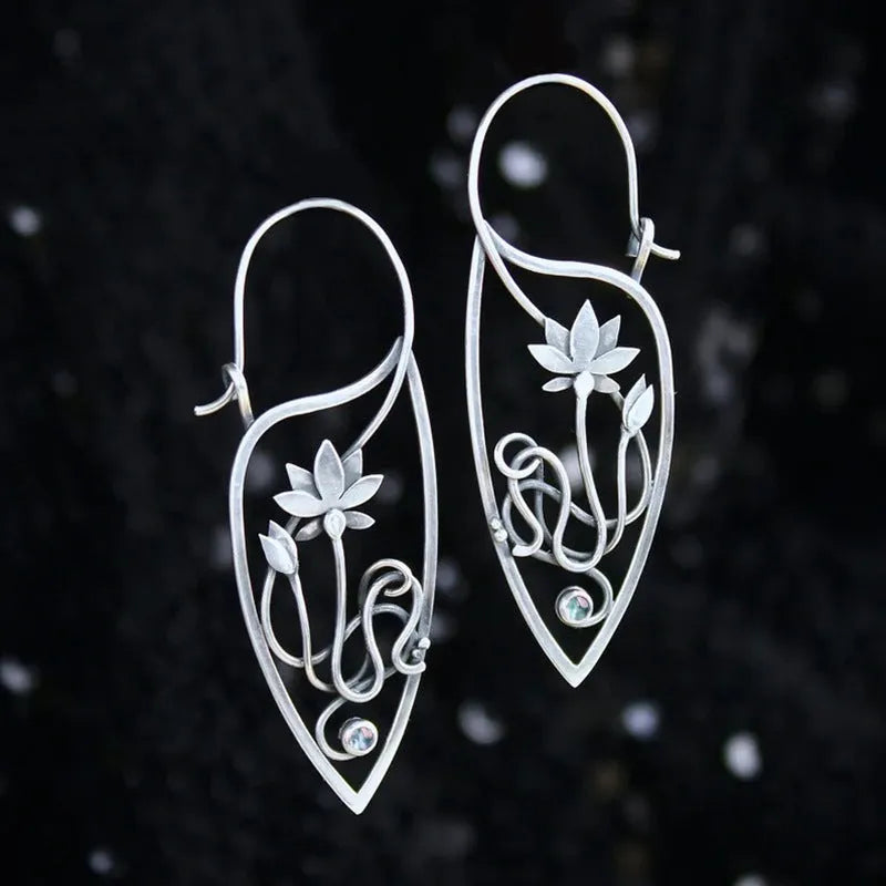Silver lotus vine design rhinestone earrings with floral geometric pattern