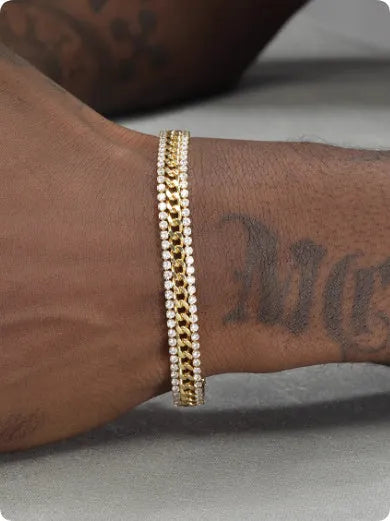 Gold tennis bracelet with gemstone inlay on titanium steel band.