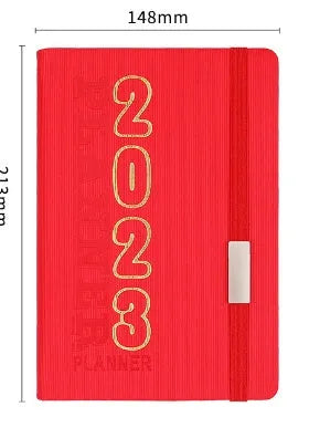 Creative student diary planner with imitation leather cover, open to show wire-o binding and calendar layout.