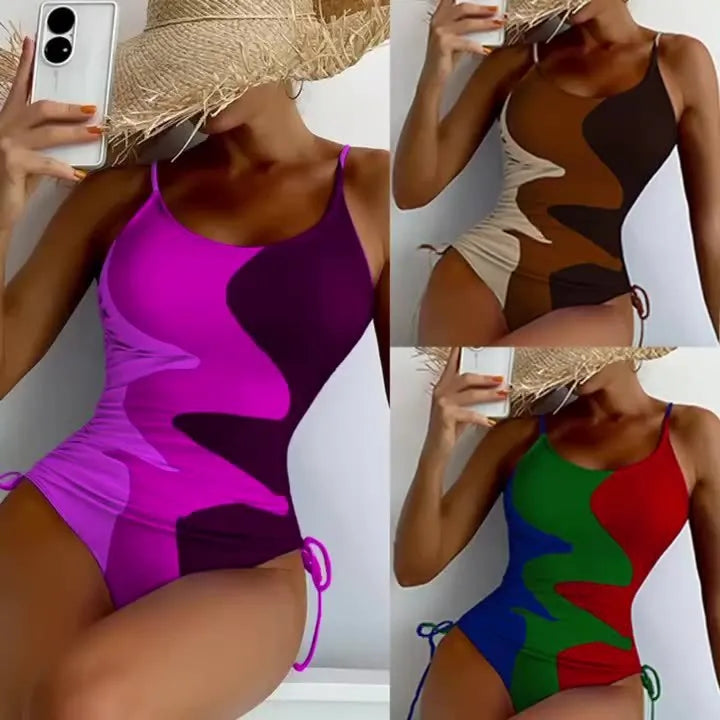 Women's blue sleeveless one-piece swimsuit with a striped pattern on a mannequin.