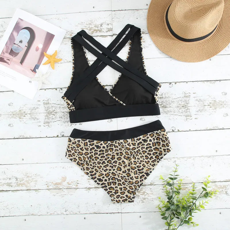 Leopard print women's bikini swimsuit with V-neck top and cross banded design