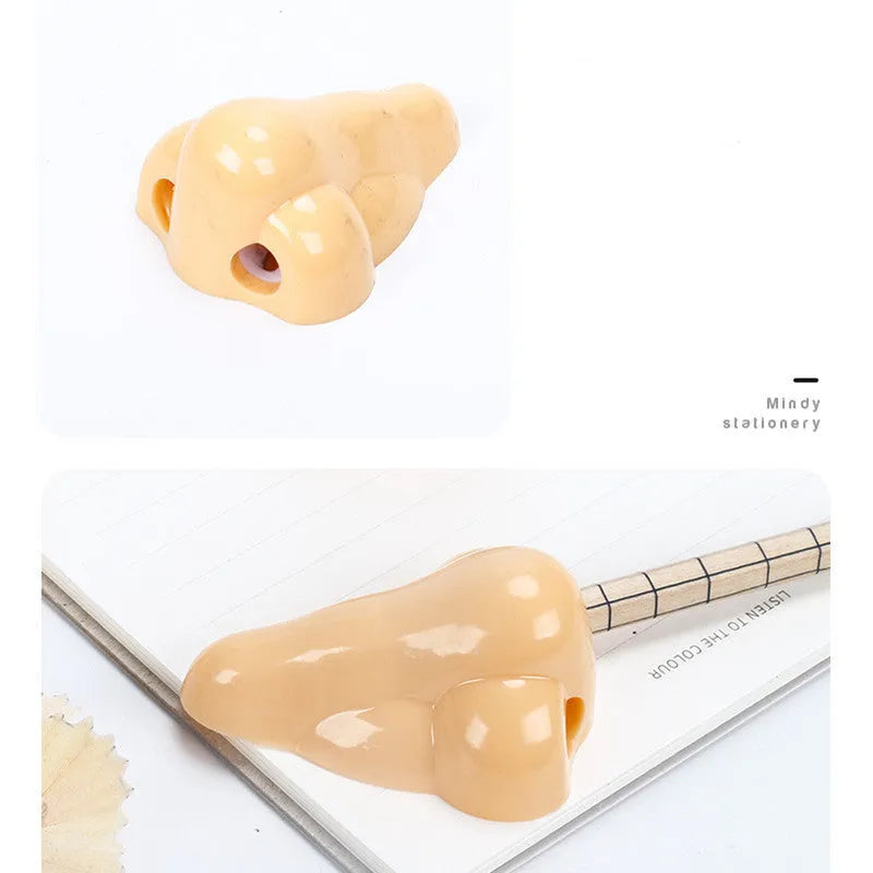 Flesh coloured geometry-shaped plastic pencil sharpener with big nostril opening