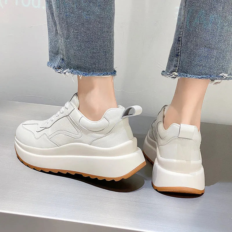 Beige women's cattlehide leather low-top sports shoes with an English muffin heel and cross strap detail