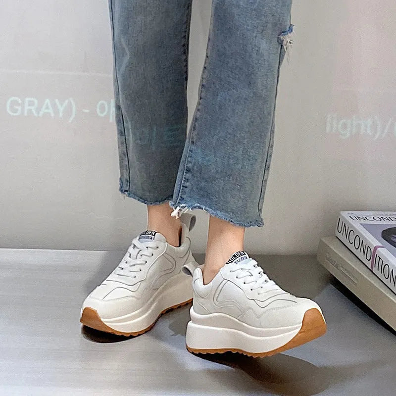 Beige women's cattlehide leather low-top sports shoes with an English muffin heel and cross strap detail