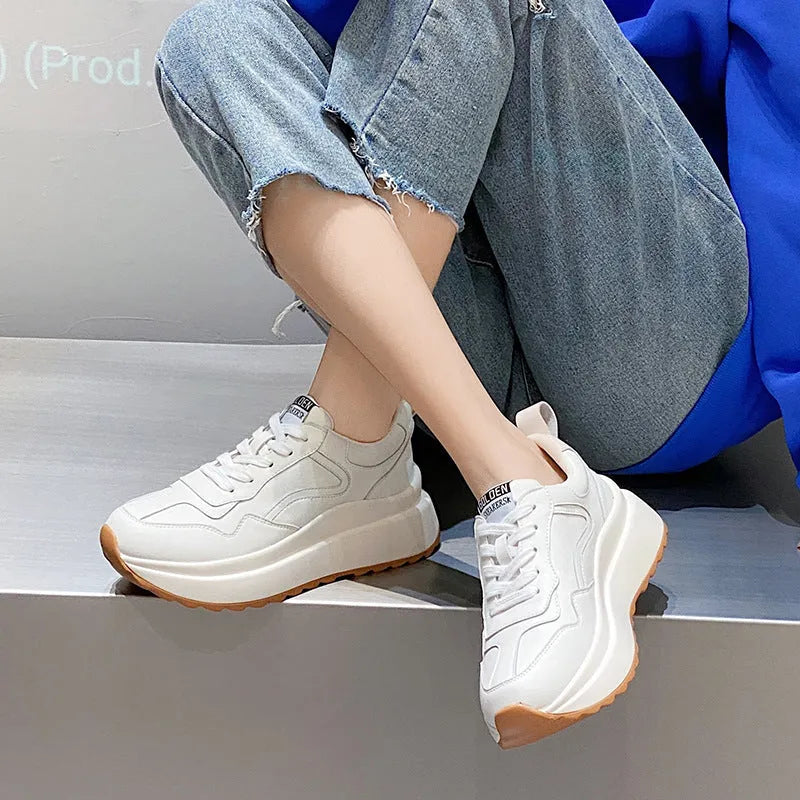 Beige women's cattlehide leather low-top sports shoes with an English muffin heel and cross strap detail