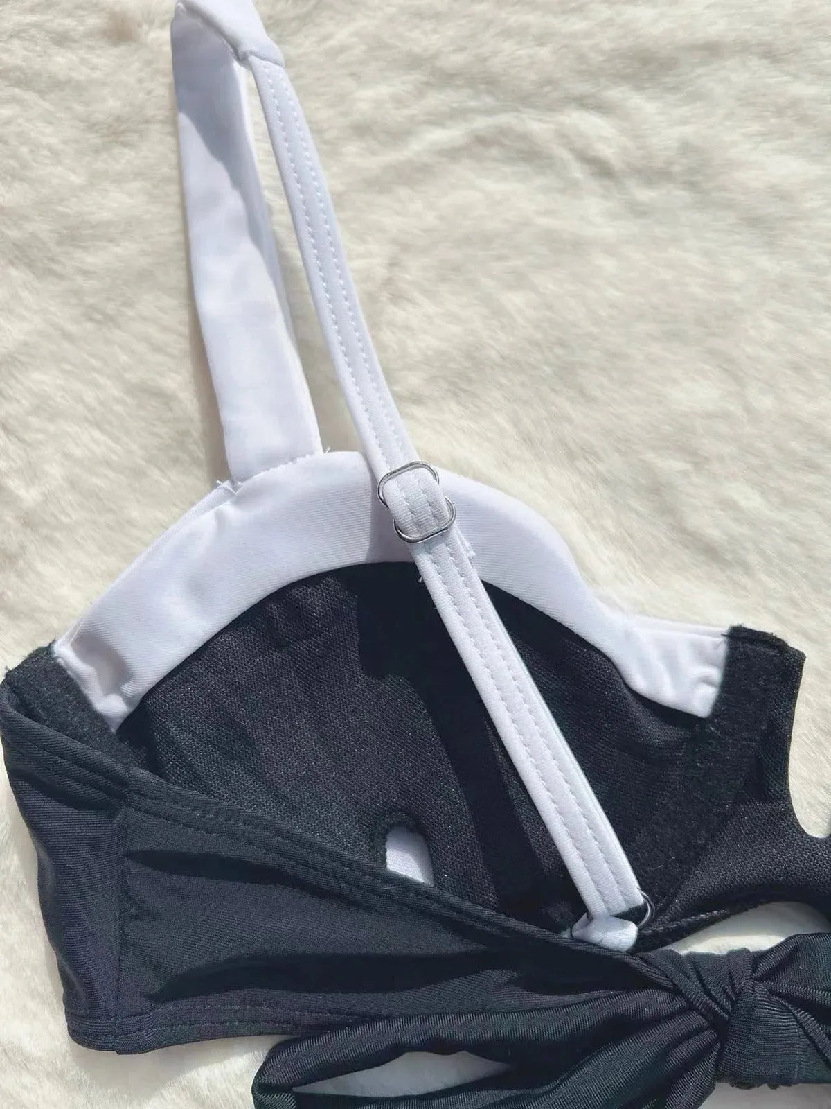 Black women's low waist bikini swimsuit set with stitching detail on split briefs