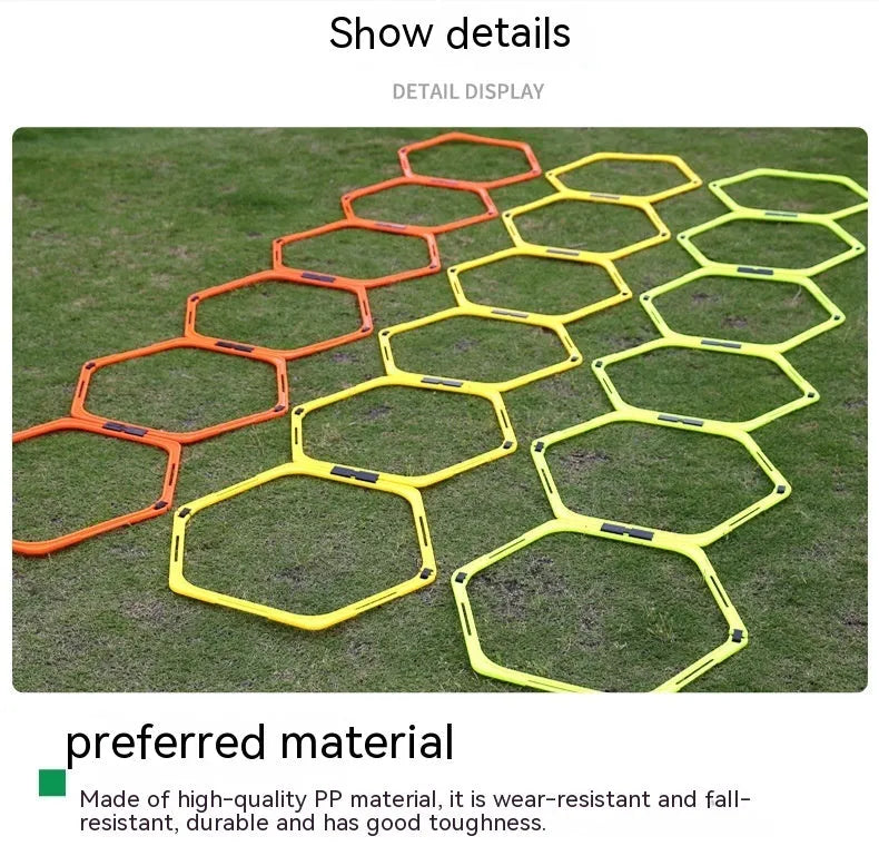 Six foldable hexagon football agility training rings in yellow, green, and orange colours laid out on grass.