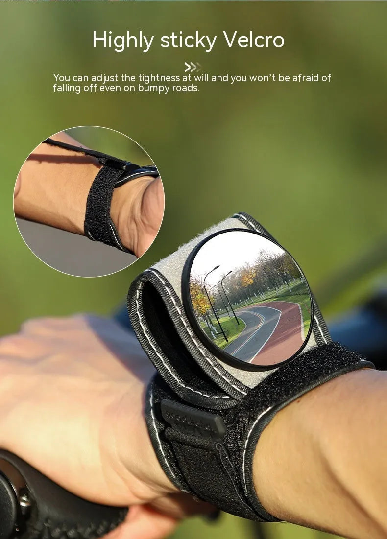 Black wrist-mounted bicycle rear-view mirror showing nylon construction and adjustable viewing angle