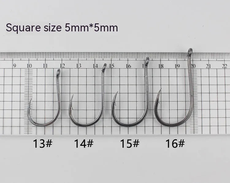 Barbed crooked mouth fishing hooks with hole rings for sea rock fishing, made from alloy carbon steel.